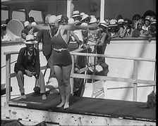 Female Civilian Diving Into the Shipboard Swimming Pool With a Crowd of Other Civilians..., 1931. Creator: British Pathe Ltd