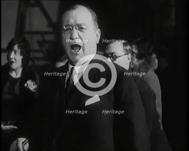 Female Civilian Singing Scales Badly Whilst Other Female Civilian is Playing the Piano in..., 1920s. Creator: British Pathe Ltd.