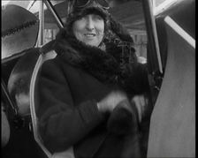 Female Civilian Wearing an Aviator's Hat Onboard of an Airplane, 1927. Creator: British Pathe Ltd