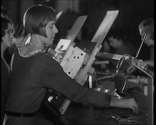 Female Civilians Working on a Factory Production Line, 1931. Creator: British Pathe Ltd