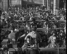 Female Civilians Working on a Factory Production Line, 1931. Creator: British Pathe Ltd