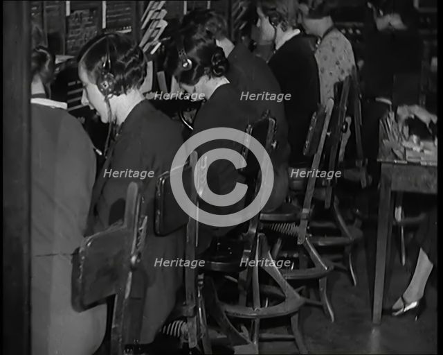 Female Civilians Working at the International Telephone Exchange, 1931. Creator: British Pathe Ltd.