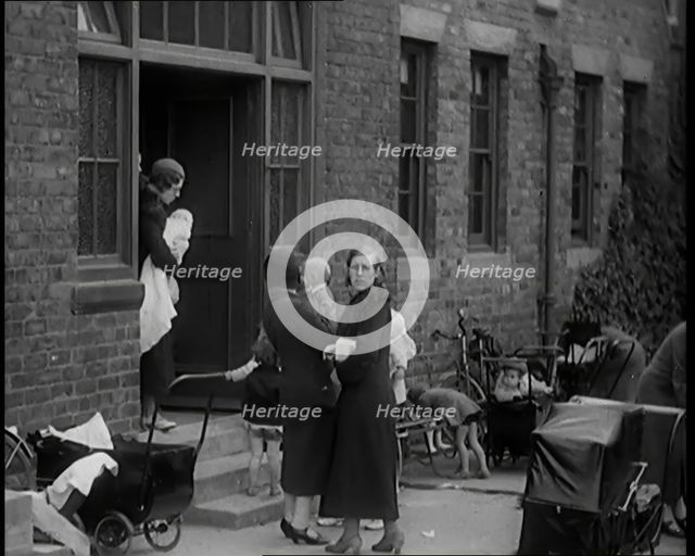 Female Civilians and Their Babies at Health Clinics Where the Babies Are Checked by Female..., 1931. Creator: British Pathe Ltd.