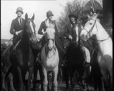 Female Civilians on Horseback Demonstrating in London Against Continuous Strikes in the Rain, 1926. Creator: British Pathe Ltd