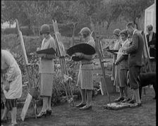 Female Civilians Outdoors Painting at Easels in an Art Class, 1920. Creator: British Pathe Ltd
