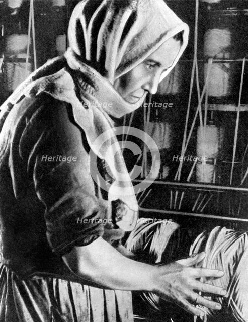 Female factory worker, Moscow, 1936. Artist: Unknown