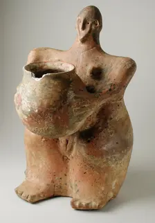 Female Figurine Holding Jar. Creator: Unknown