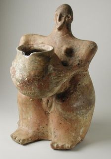 Female Figurine Holding Jar. Creator: Unknown