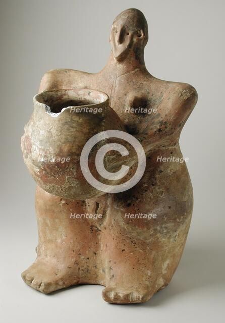 Female Figurine Holding Jar. Creator: Unknown.