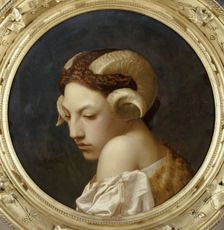 Female head crowned with ram horns