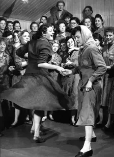 Female ICI employees enjoy a dance, South Yorkshire, 1957. Creator: Michael Walters