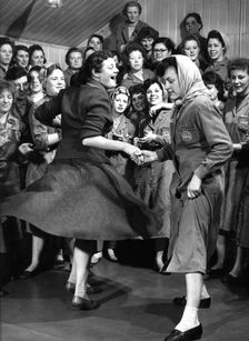 Female ICI employees enjoy a dance, South Yorkshire, 1957. Creator: Michael Walters