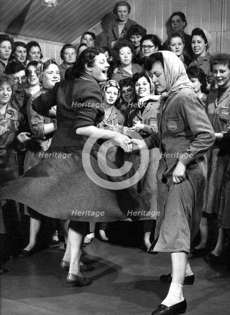 Female ICI employees enjoy a dance, South Yorkshire, 1957. Creator: Michael Walters.