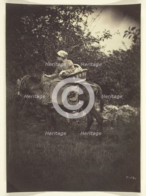 Female Peasant Riding Donkey, 1870. Creator: Giraudon's Artist.