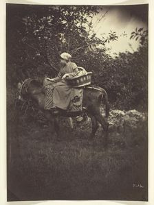 Female Peasant Riding Donkey, 1870. Creator: Giraudon's Artist