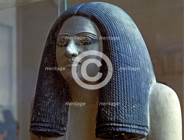 Female statue from the Tomb of SEPA, chief of the southern army, held in polychromed limestone.