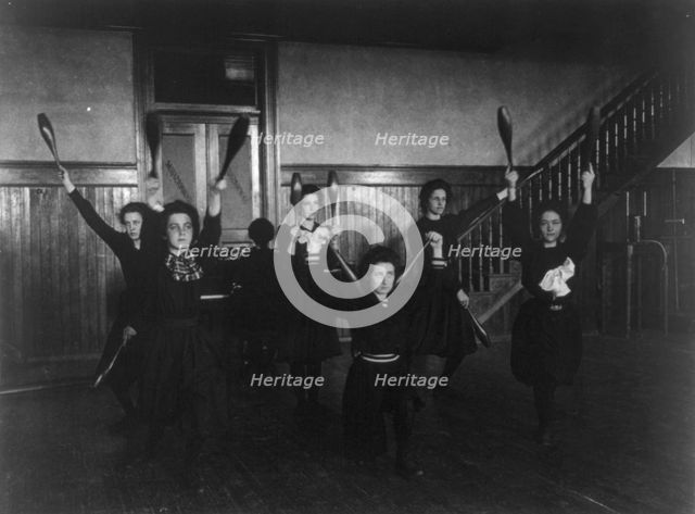 Female students exercising with bowling pins, Western High School, Washington, D.C., (1899?). Creator: Frances Benjamin Johnston.