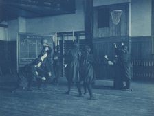 Female students playing basketball, Western High School, Washington, D.C., (1899?). Creator: Frances Benjamin Johnston