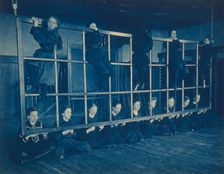 Female students posing with exercise equipment in a gymnasium, Western..., Washington DC, (1899?). Creator: Frances Benjamin Johnston