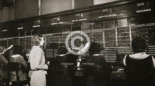 Female workers in the telephone room, New York Stock Exchange, USA, early 1930s. Artist: Unknown