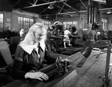 Female workers sharpening saw blades at Slack Sellars & Co, Sheffield, South Yorkshire, 1963. Creator: Michael Walters