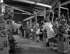 Female workers sharpening saw blades, Sheffield, South Yorkshire, 1963. Creator: Michael Walters