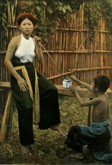 Femme Fumant De L'Opium (Woman Smoking Opium), 1900. Creator: Unknown