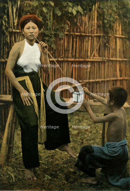 'Femme Fumant De L'Opium', (Woman Smoking Opium), 1900. Creator: Unknown.