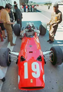 Ferrari in pits during 1968 Spanish Grand Prix, Chris Amon. Creator: Unknown