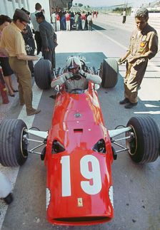 Ferrari in pits during 1968 Spanish Grand Prix, Chris Amon. Creator: Unknown