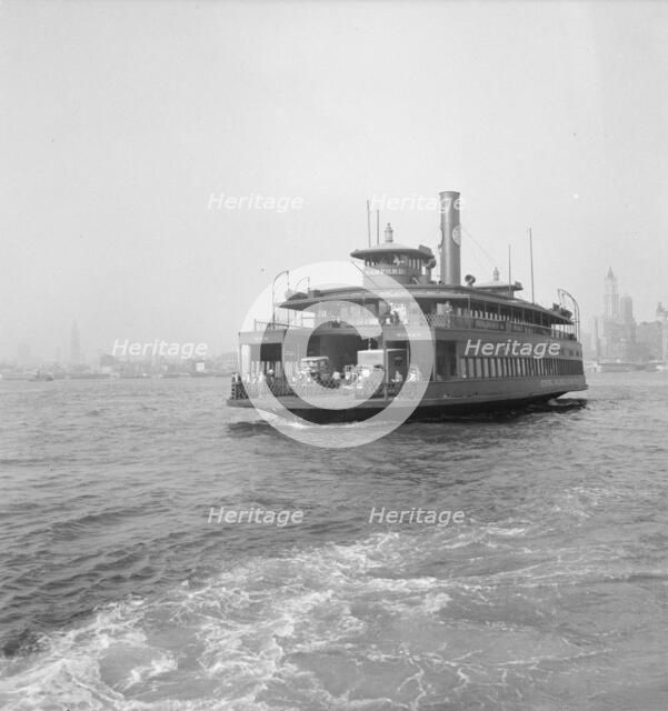 Ferry boats still transport some of the traffic between New York City and Jersey, 1939. Creator: Dorothea Lange.