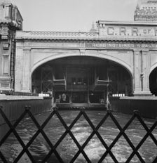 Ferry slip seen from ferry which transports passengers across the Hudson..., New York City, 1939. Creator: Dorothea Lange