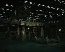 Fitting the tail of a transport plane to the wing...Consolidated Aircraft..., Fort Worth, TX, 1942. Creator: Howard Hollem