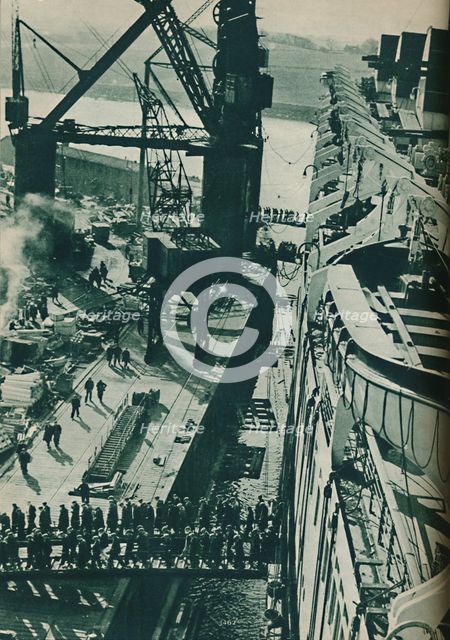 'Fitting-Out Basin of John Brown and Company's shipbuilding yard at Clydebank', 1937. Artist: Unknown.