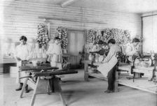 Five boys making tin utensils, Carlisle Indian School, Carlisle, Pennsylvania, 1901. Creator: Frances Benjamin Johnston