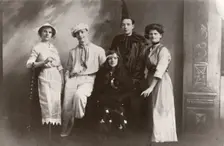 Five costumed figures, 1913