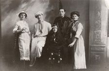Five costumed figures, 1913