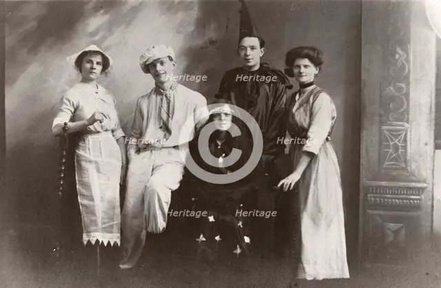 Five costumed figures, 1913. Artist: Unknown