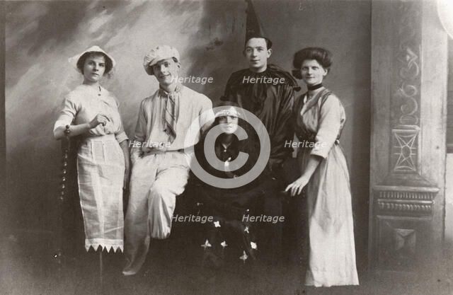 Five costumed figures, 1913. Artist: Unknown