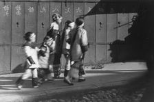 Five girls in holiday finery, Chinatown, San Francisco, between 1896 and 1906. Creator: Arnold Genthe