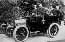 Five men sitting in a motor car, 1902 (1935)