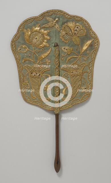 Fixed fan of green silk with straw embroidery and wooden handle, England, c.1740. Creator: Unknown.