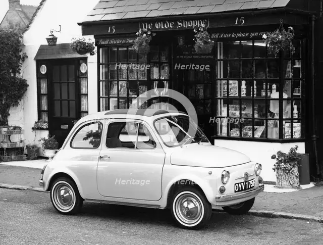 Fiat 500 parked outside a quaint shop, 1969. Artist: Unknown