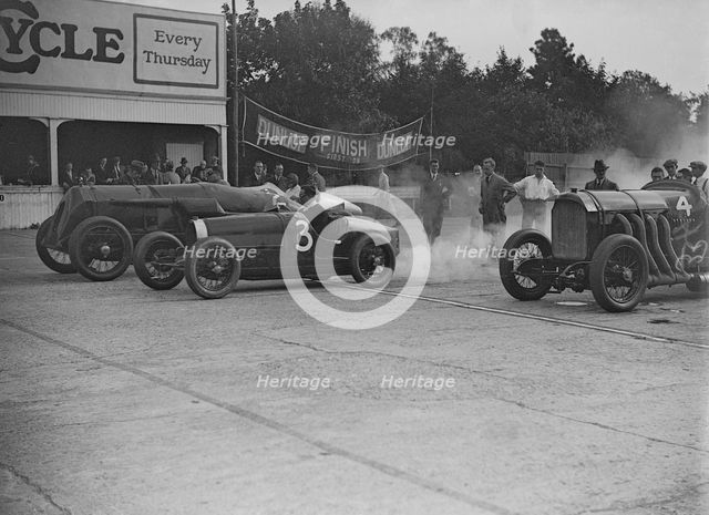 Fiat, Bugatti and Benz competing at a Surbiton Motor Club race meeting, Brooklands, Surrey, 1928. Artist: Bill Brunell.
