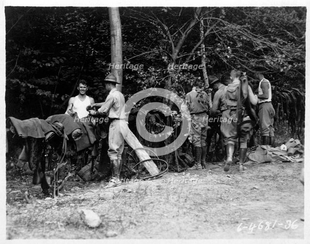 Field Artillery cadets cleaning harnesses on a training hike, Fort Sheridan, Illinois, USA, 1920. Artist: Unknown