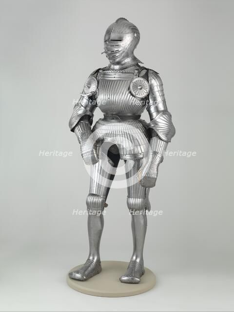 Field armour, German, Nuremberg, ca. 1525; left arm defense, 19th century; rondels, 1923. Creator: Unknown.