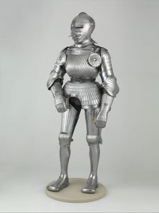 Field armour, German, Nuremberg, ca. 1525; left arm defense, 19th century; rondels, 1923. Creator: Unknown