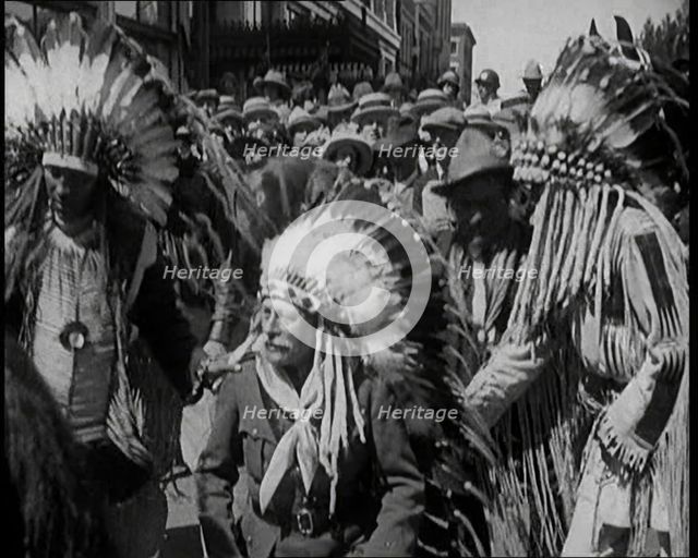 Field Marshal Douglas Haig, 1st Earl Haig, Wearing a Native American Headdress, 1921. Creator: British Pathe Ltd.