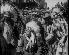 Field Marshal Douglas Haig, 1st Earl Haig, Wearing a Native American Headdress, 1921. Creator: British Pathe Ltd