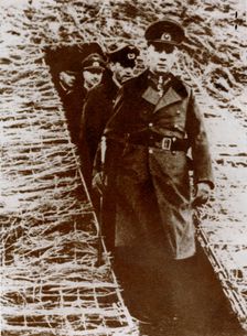 Field Marshal Erwin Rommel inspecting a dugout on the Channel coast, France, World War II, 1944 Creator: Unknown